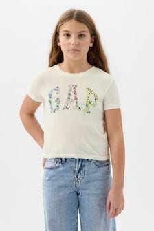 Weißes Modell mit floralem Muster - Gap Kurzärmeliges T-Shirt mit Rundhalsausschnitt und Logo-Grafik (4-13yrs) (K90619) | 16 €