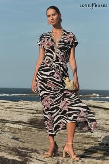 Love & Roses Black Zebra Sequin Trim Hanky Hem Short Sleeve Midi Dress (K99447) | $106