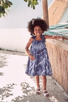 שמלת כותנה עם קשירה בכתפיים (גילאי 3 עד 16)