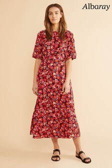 Robe mi-longue Albaray rose à large motif œillet et manches bouffantes