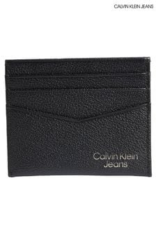 Tarjetero negro con acabado microgranulado de Calvin Klein (M36211) | 55 €