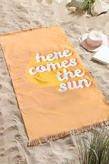 Ręcznik plażowy z napisem Here Comes The Sun (M41068) | 69 zł