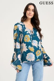 Синяя блузка с V-образным вырезом и цветочным принтом Guess Faiza (M70265) | €53