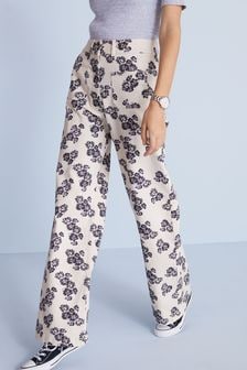 Кремово-бежевый с цветочным принтом - Широкие джинсы с карманами спереди (M73258) | €41