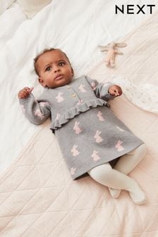  (M84066) | €20 - €22 Sivá so zajačikmi - Dojčenské pletené šaty s volánikmi (0 mes. – 2 rok.)