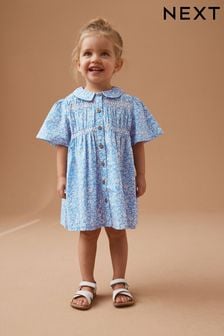 Blau geblümt - Kleid aus Baumwolle mit gezurrtem Design (3 Monate bis 7 Jahre) (N02847) | 20 € - 23 €