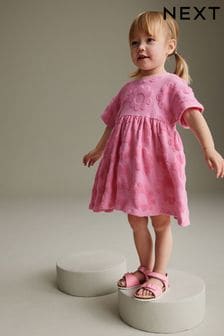 Rosa brillante - Vestido de tela de toalla con textura (3 meses - 7 años) (N04840) | 14 € - 17 €