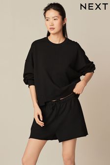 Schwarz - Sweatshirt mit Rundhalsausschnitt, Waschung und grobem Saum (N07651) | 41 €