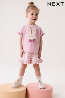 Personaje de conejito rosa - Conjunto corto con volantes (3 meses - 7 años) (N12454) | 12 € - 18 €