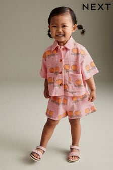 Rosa con flor - Conjunto de camisa de manga corta y pantalones cortos (3 meses-7 años) (N12459) | 15 € - 21 €