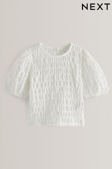 Biały - Teksturowana koszulka z bufiastymi rękawami (3-16 lat) (N12637) | 42 zł - 63 zł