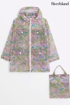 River Island Klarer Regenmantel für Mädchen mit Tasche​​​​​​​ und Blumenmuster (N21945) | 49 € - 61 €