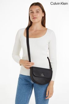 حقيبة طراز سرج بشعار حروف الماركة من Calvin Klein (N24131) | 544 ر.ق