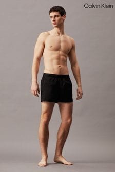 Črna - Calvin Klein enobarvne kopalne kratke hlače (N27028) | €68