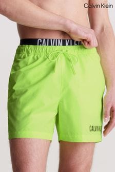 Vert - Calvin Klein Short de bain à taille à slogan (N27037) | €76