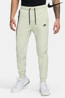 Kremowy - Spodnie do biegania z polaru Nike Tech (N30355) | 570 zł