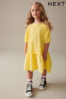 أصفر ناعم - فستان مزركش ثلاثي الأبعاد (3-16 سنة) (N32142) | 107 ر.س - 137 ر.س