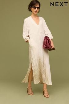 Neutralny - Teksturowana sukienka midi z wiązaniem w talii i nadrukiem (N32683) | 250 zł