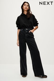 Czarny - Luźne jeansy z szerokimi nogawkami (N33618) | 285 zł