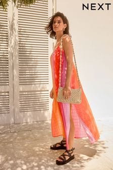 Pomarańczowo-różowy z efektem ombre - Letnia sukienka maxi z obszernymi teksturami (N38132) | 210 zł