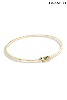 COACH Gold Tone Signature Interlock Bangle Bracelet (N44567) | ₪ 349
