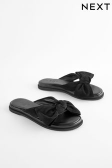 Black Forever Comfort® Bow Mule Sandals (N47396) | $72