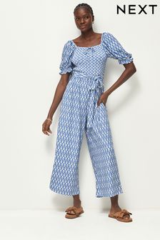 Blue Ikat Print Short Sleeve Tie Front Jumpsuit (N57396) | €48