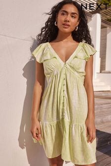 Biały/limonkowy z efektem tie-dye - Letnia kobieca sukienka mini z falbanką (N57717) | 200 zł