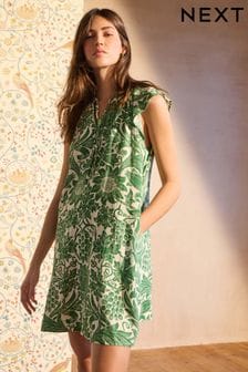 Morris & Co. w słoneczniki - Letnia sukienka mini Blend z lnu i wiązaniem przy szyi (N61119) | 200 zł