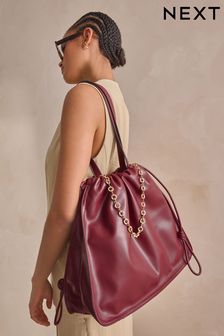 Burgundy bags next store