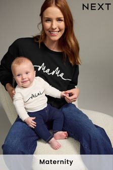 Next maternity clothes in store shop