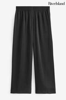 River Island Black Petite Satin Pull On Elasticated Trousers (N95503) | AED170