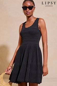 Lipsy Black Petite Knitted Stitch Detail Fit and Flare Mini Dress (N99930) | $82