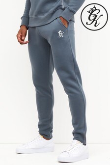 אפור - מכנסי טרנינג מחודדים עם לוגו של Gym King דגם Pro (Q02481) | ‏128 ₪