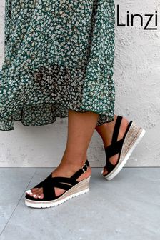 Linzi Black Myla Sling Back Wedge Sandal With Cross Over Front Strap (Q07768) | ₪ 163