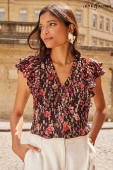 Love & Roses Black Floral Metallic V Neck Ruffle Tie Back Top (Q38494) | €23