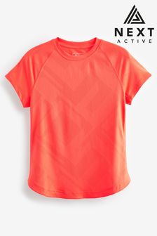 Coral Pink Active Short Sleeve Jacquard Geo Sport Top (Q53879) | SGD 35