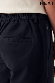 Granatowy - Spodnie typu chino o dopasowanym kroju z elastyczną talią i stretchem (Q54993) | 135 zł