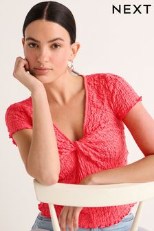 Pink Textured Twist Front Short Sleeve Top (Q56180) | SGD 38