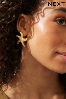 Złoty kolor - Starfish Statement Stud Earrings Made With Recycled Zinc (Q67669) | 50 zł