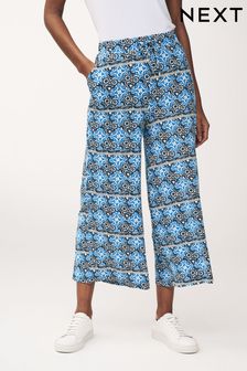 בצבע כחול כהה עם פרחים - מכנסי-חצאית מג'רזי (Q70516) | ‏83 ‏₪
