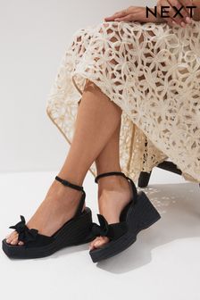 Black Forever Comfort® Leather Bow Wedges (Q75607) | $58