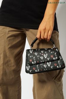 Черная сумка с длинным ремешком и сердечками Skinnydip April (Q84509) | €16