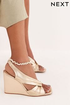 Gold Signature Leather Knot Wedges (T11266) | $100