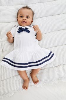 White/Navy Blue Sailor Baby Dress (0mths-2yrs) (T23584) | €21.50 - €22.50