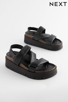 Schwarz - Sandalen aus weichem Leder mit asymmetrischem Keilabsatz (T25337) | 86 €