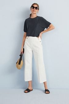 Bílá - Elegantní tříčtvrteční džíny na knoflíky s širokými nohavicemi (T48909) | 1 170 Kč