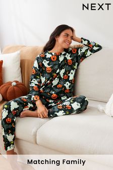 Negro con fantasmas que brillan en la oscuridad - Pijama de manga larga de algodón de Halloween (T61696) | 42 €