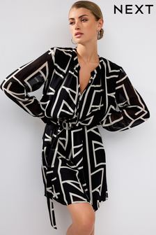 Noir et blanc motif abstrait - Mini robe à manches longues nouée à la taille (T72678) | €68