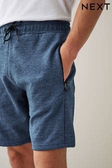 Azul - Pantalones cortos de punto con bolsillos con cremallera (U01906) | 25 €